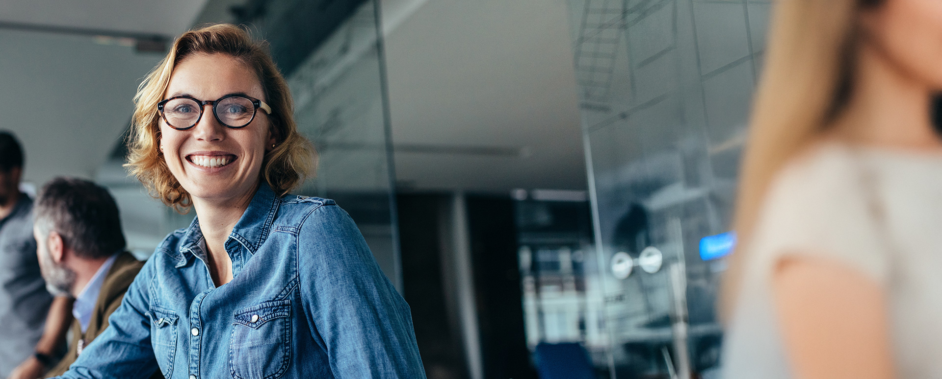 Smiling young woman at the office